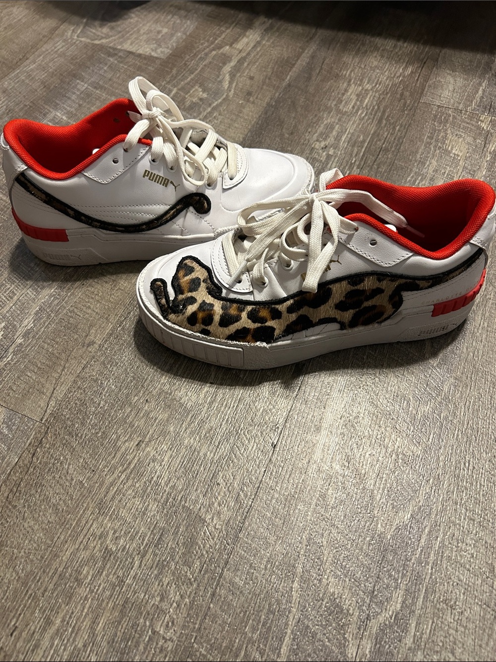 Puma White Sneakers with Red Lining and Leopard Accent